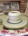 make a pot on the wheel throw a pot clay ceramic pottery