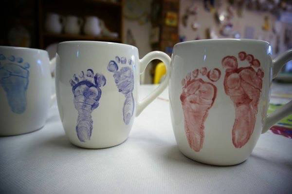 Baby footprints on mugs